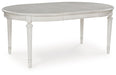 Montelaine Dining Extension Table - Furniture Land (Milwaukee, WI)