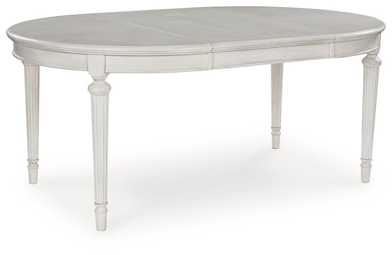 Montelaine Dining Extension Table - Furniture Land (Milwaukee, WI)