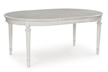 Montelaine Dining Extension Table - Furniture Land (Milwaukee, WI)