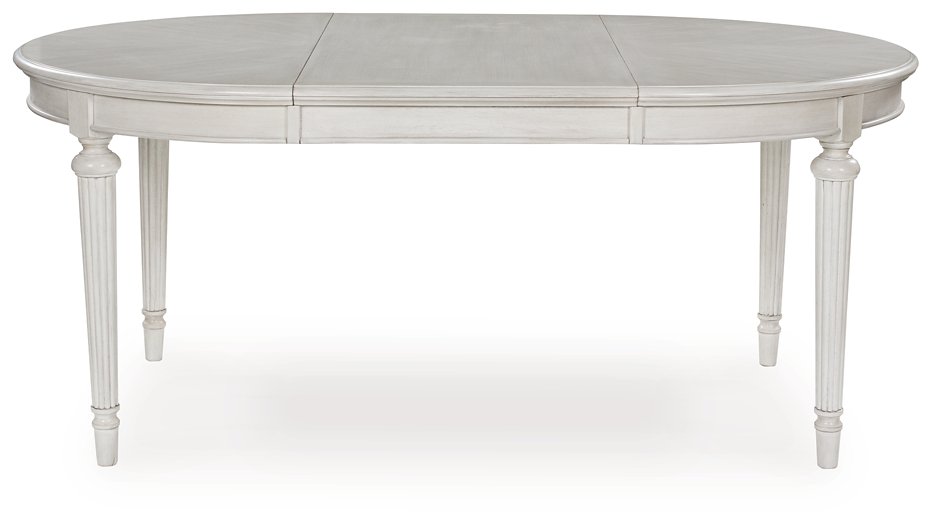Montelaine Dining Extension Table - Furniture Land (Milwaukee, WI)