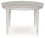 Montelaine Dining Extension Table - Furniture Land (Milwaukee, WI)