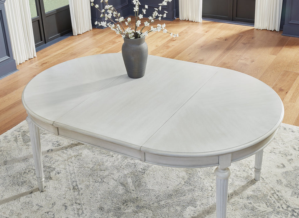 Montelaine Dining Extension Table - Furniture Land (Milwaukee, WI)