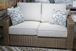 Laguna Heights Outdoor Loveseat with Cushion - Furniture Land (Milwaukee, WI)