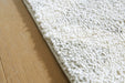 Unawick Medium Rug - Furniture Land (Milwaukee, WI)